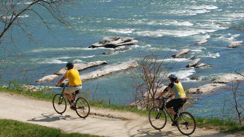 Two bicyclists riding along the Chesapeake and Ohio Canal