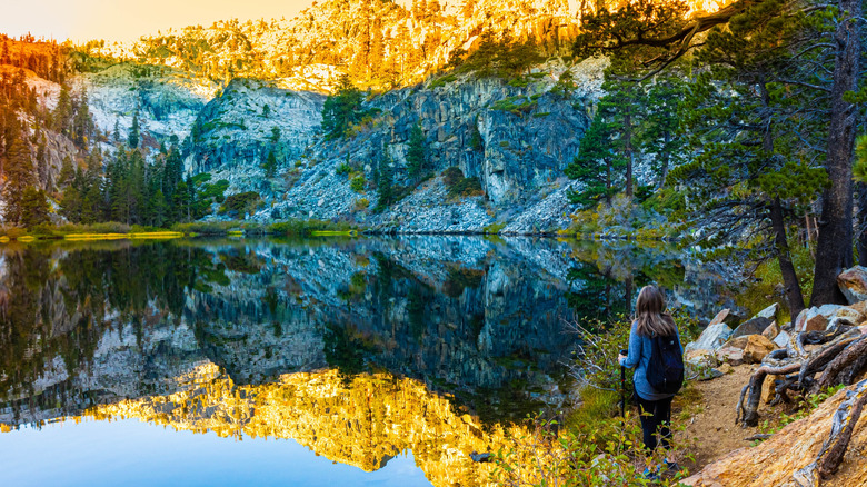 Female hiker overlooking Eagle Lake in Desolation Wilderness