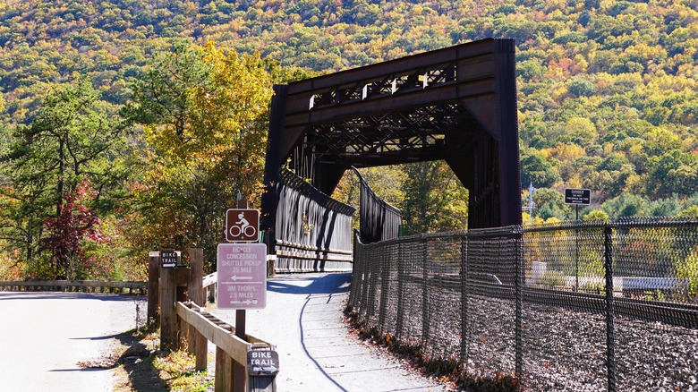 The Lehigh Gorge cycling trail over a metal bridge in Pennslyvania