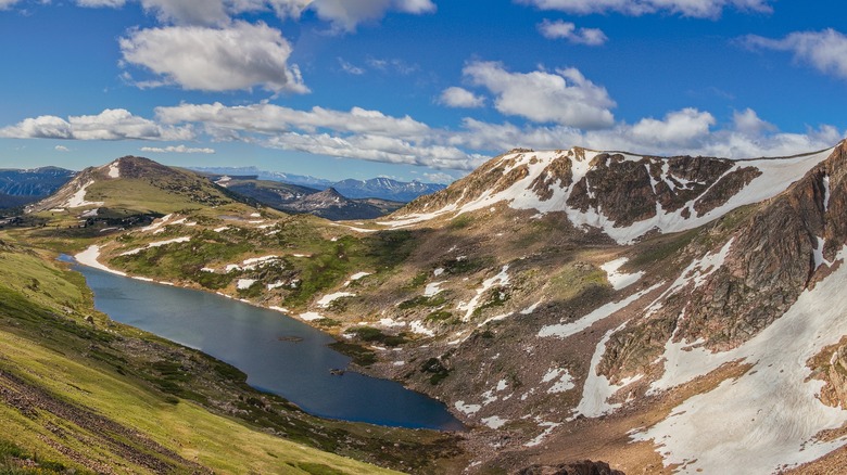 An overlook of a lake and mountain scenery on Beartooth Highway near Red Lodge