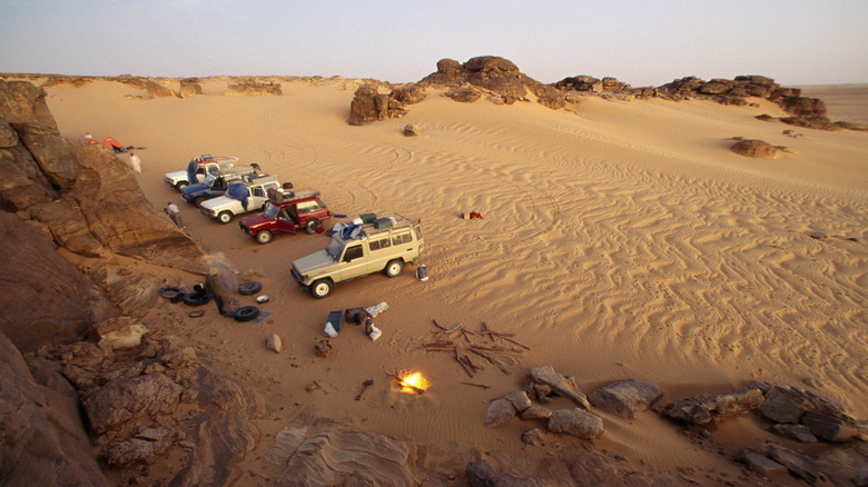 Cars parked on Sahara Desert in Chad