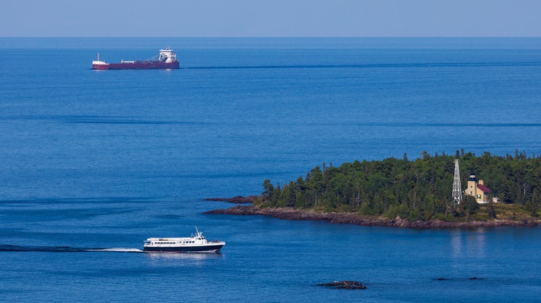 Copper Harbor Lighthouse with the Isle Royale ferry arriving