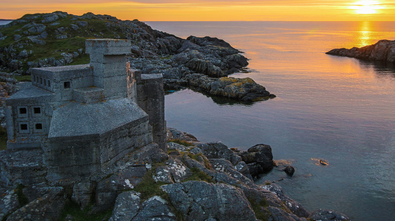 Sunset at Achmelvich with a view of Hermit's Castle