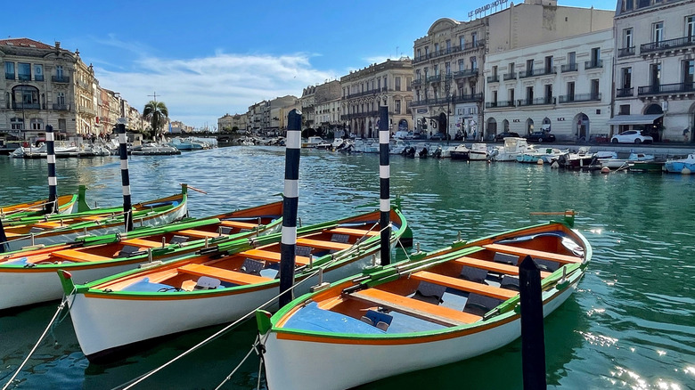 Boats floating on a canal in Sete, France