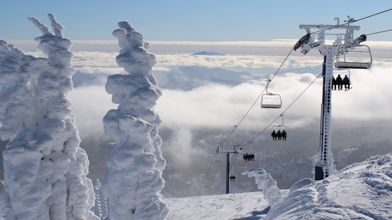 Snow-coovered chairlift at Schweitzer Mountain Ski Resort near Coeur d'Alene, Idaho