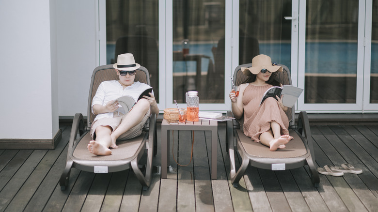 A couple relaxing at a resort