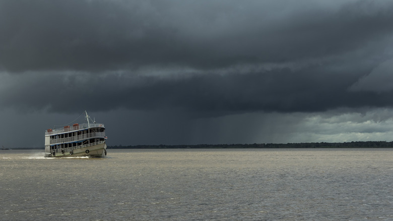 a river boat on a rainy day in the Amazon near Manaus