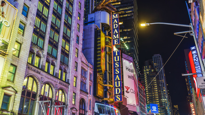 Sign of Madame Tussauds NYC in Times Square at night