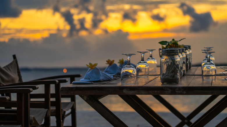 Main beach dining area of Nikoi Island resort in Indonesia, seen just after sunset