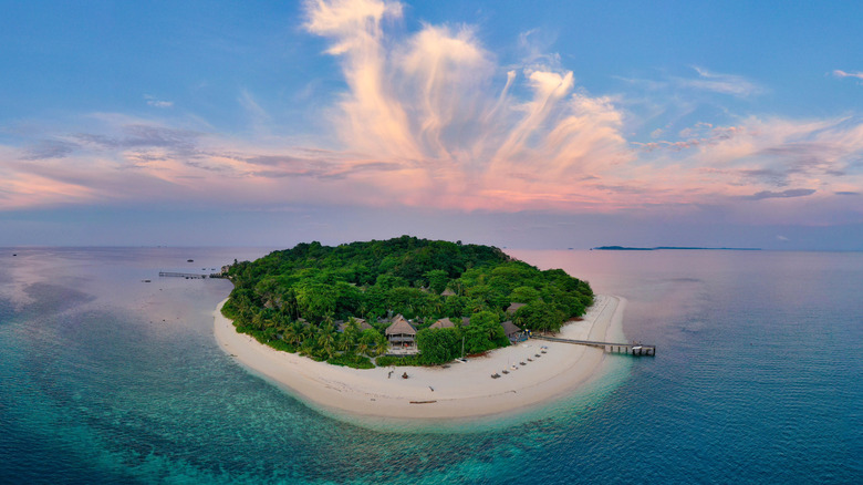 Panoramic image of Nikoi Island resort in Indonesia at sunset