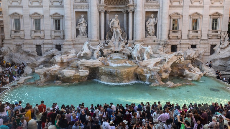 Crowded Trevi Fountain in Rome