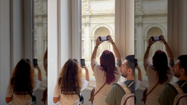 Pics of Trevi Fountain from store window