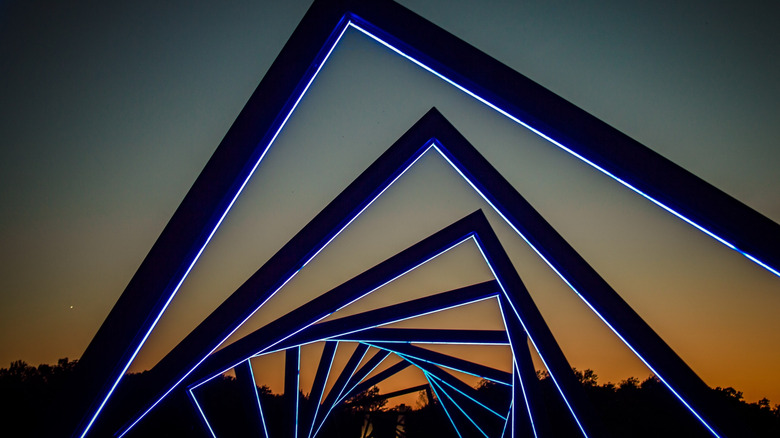 High Trestle Trail Bridge with blue lights at night in Madrid, Iowa