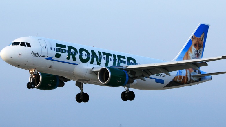 One of Frontier's aircrafts flying in the air