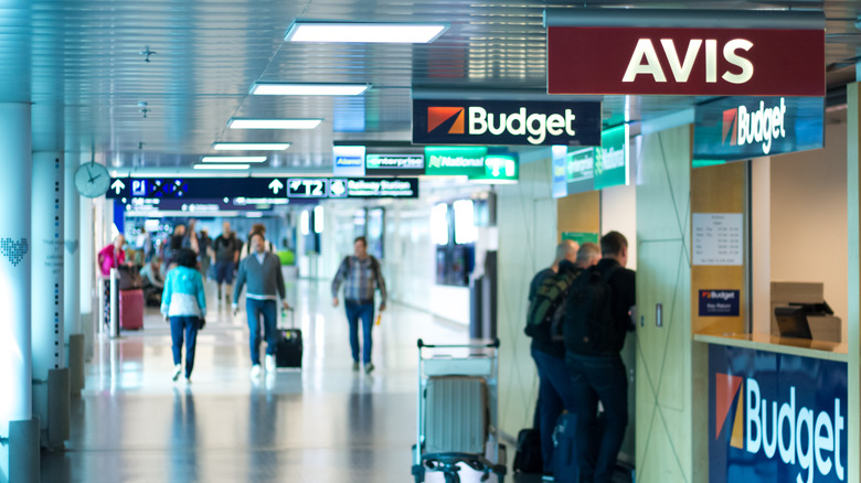 Car rental company signs at an airport