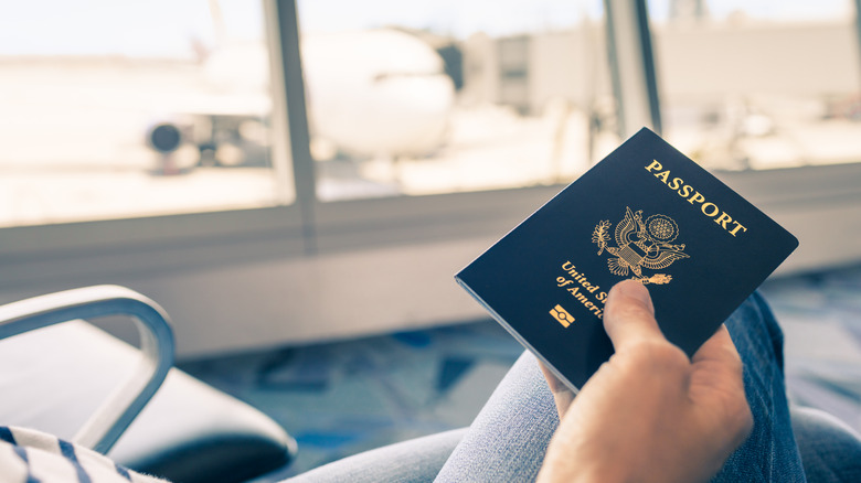 Person at airport with passport