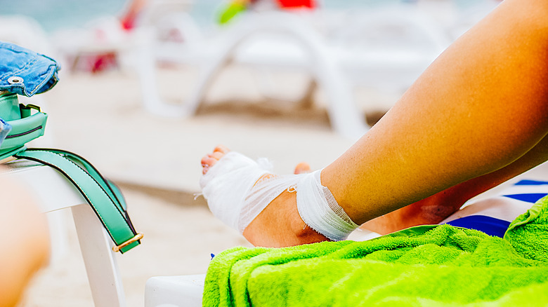 Injured foot wrapped in gauze.