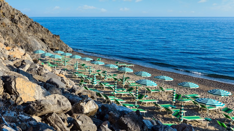 Beach with umbrellas in Cilento, Italy