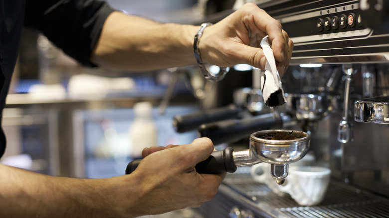 Person making espresso