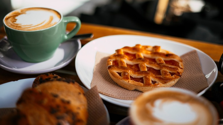 Cappuccino with breakfast items