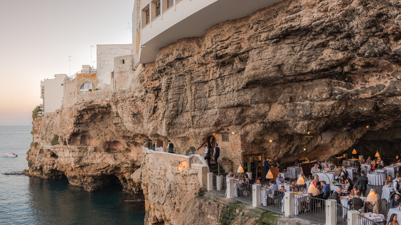 Grotta Palazzese restaurant at sunset