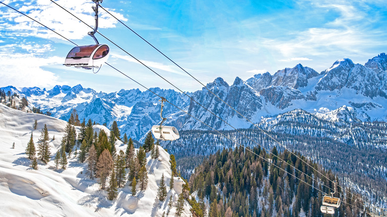 A ski lift in Cortina d'Ampezzo with the Dolomites in the background