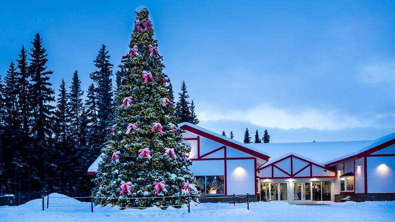 The Santa Claus House in North Pole, AK with snow outside