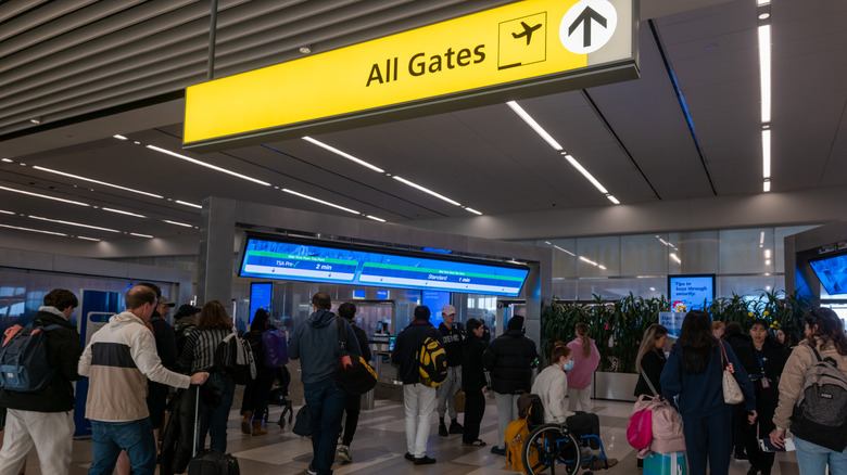 People walking to their gate at a New York airport