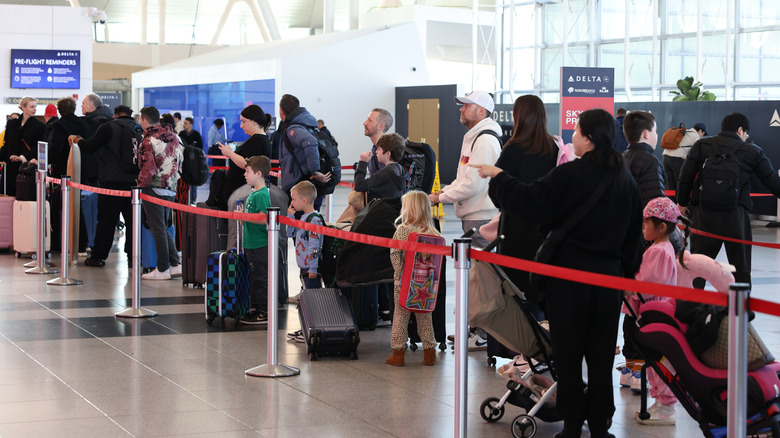 People waiting in line at a New York airport