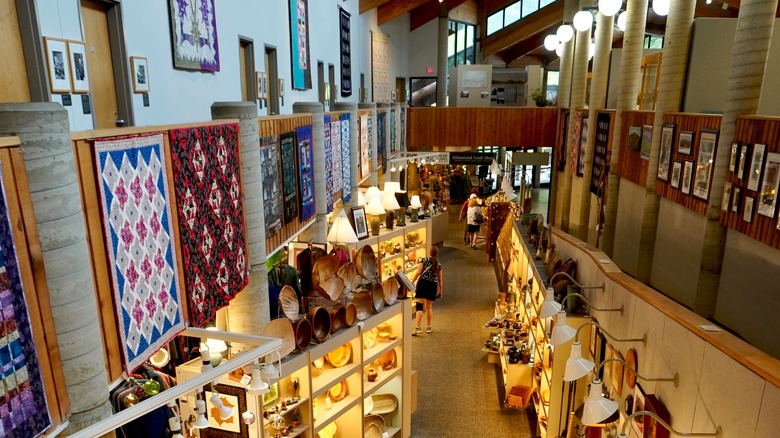 Inside the Folk Art Center, featuring rows of handcrafted art