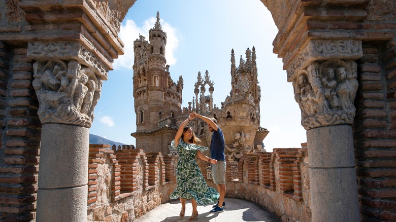 Tourists dancing in alcove at Castillo de Colomares.