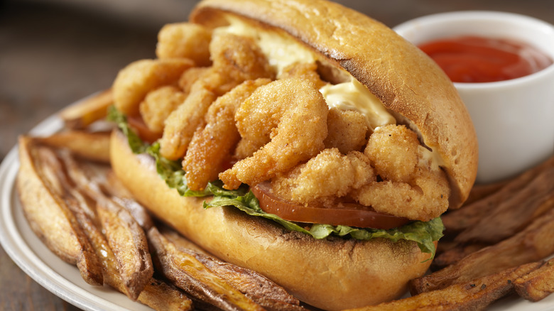 Po Boy and fries on plate