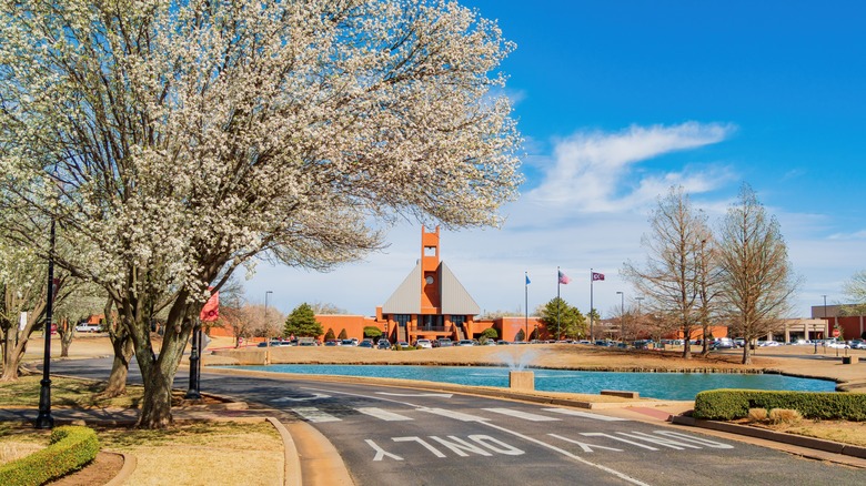 Sunny day in Edmond Downtown with view of trees and university campus