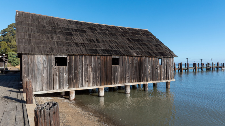 Wooden hut on water from old fishing village at China Camp State Park