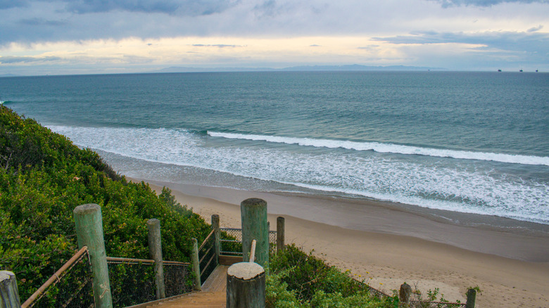 Wooden stairs to calm beach