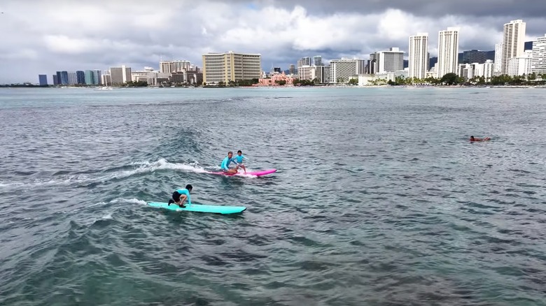 Learning to surf in Waikiki