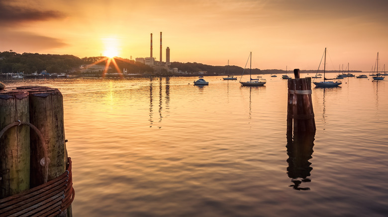 Sunset view of boats and Port Jeff Harbor