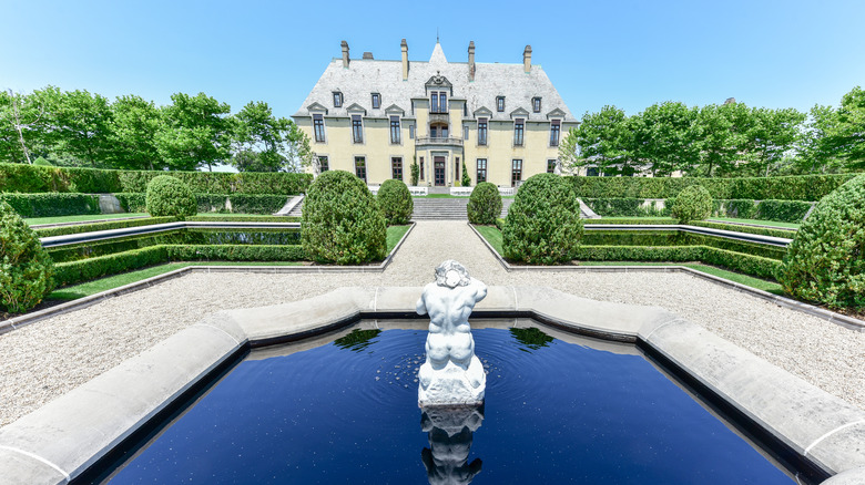 Oheka Castle surrounded by a garden landscape