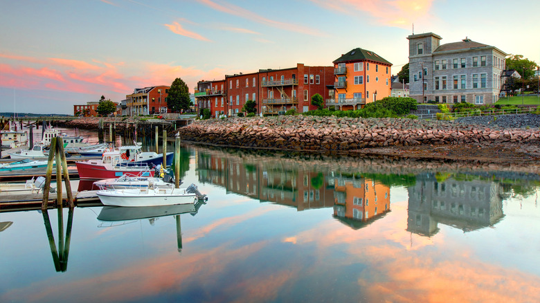 Boats and houses in Eastport Maine seen from the waterfront