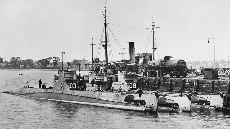 War ships and submarines docked at Portsmouth Naval Shipyard