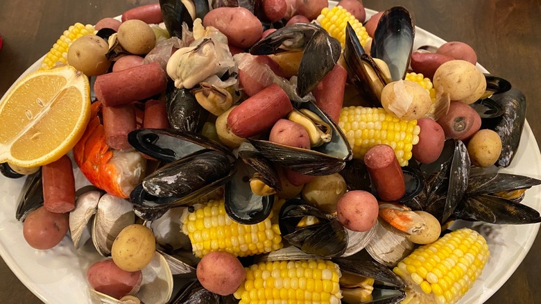 clambake platter with lobster and corn on the cob