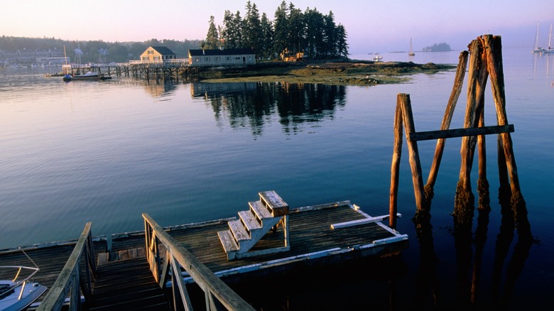 dock on Boothbay Harbor, Maine, in early light with an island in the distance