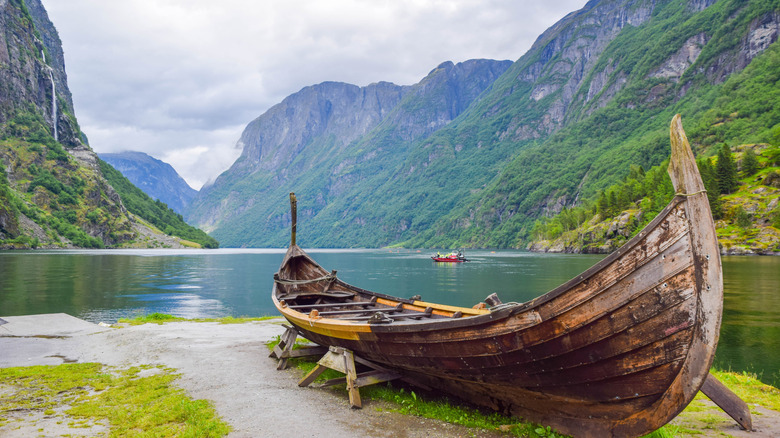 A wooden Viking ship in a Norwegian fjord.