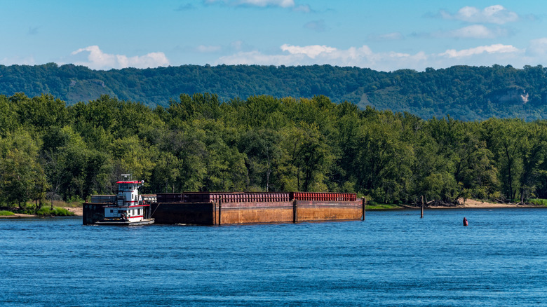 Tugboat helping a barge on the Mississippi River near Wabasha