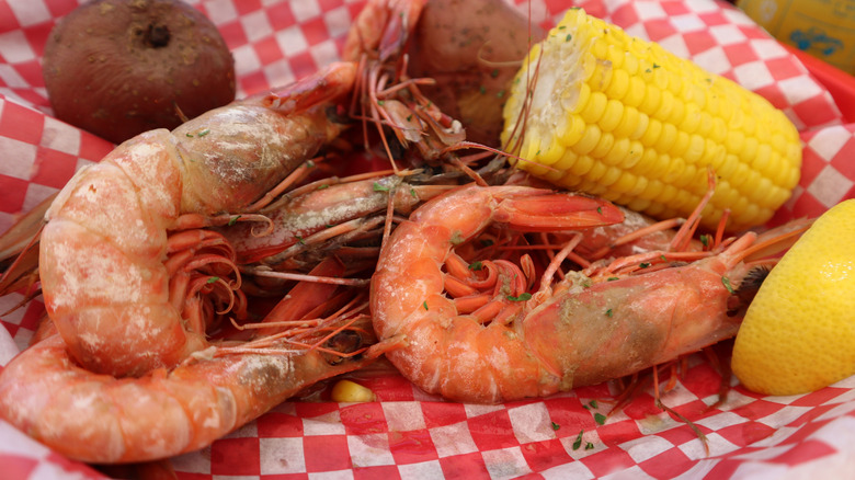 Cooked Gulf shrimp and corn on the cob in basket