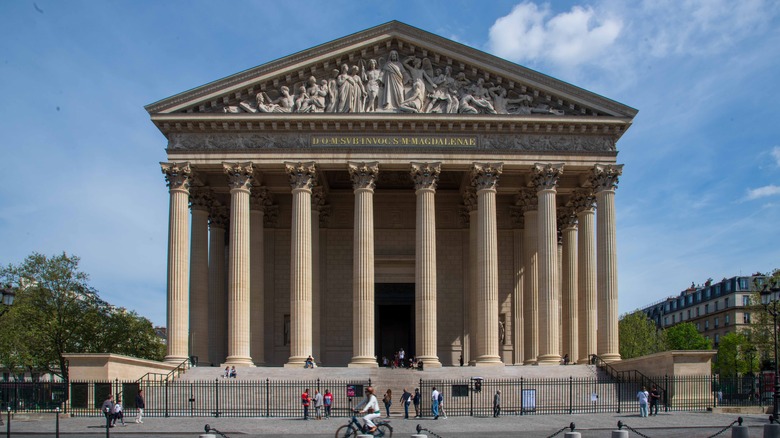 La Madeleine exterior in Paris with pedestrians in front