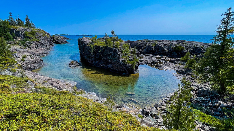 Water and rocky terrain at Isle Royal National Park in Michigan on a clear day