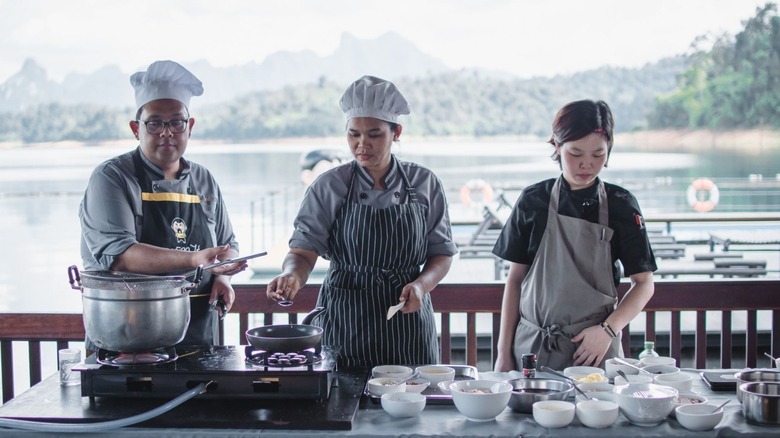 Cooking demonstration by three chefs at 500 Rai Resort, Thailand