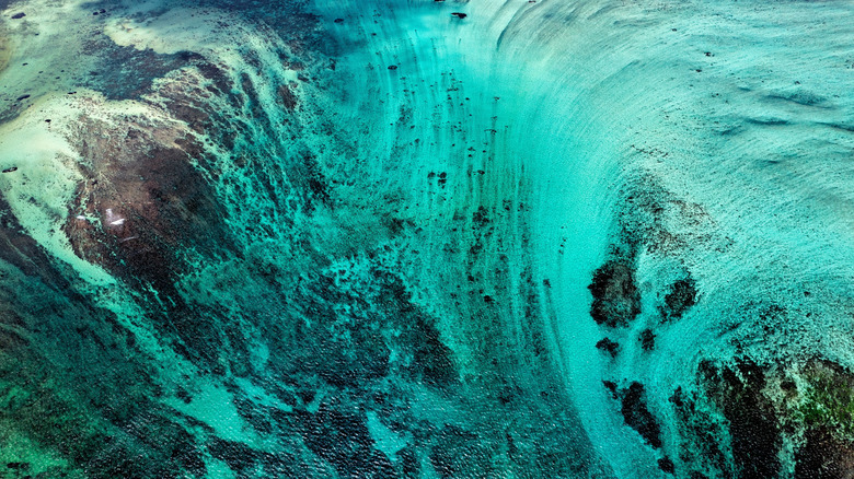 Mauritius blue lagoon underwater waterfall in the Indian Ocean