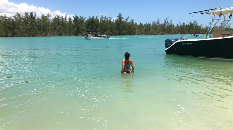 Swimmer and boat on Keewaydin